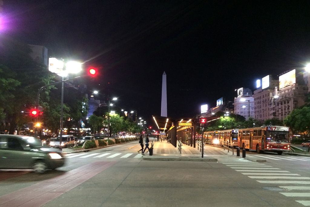 07 Buses Travel Along Avenida 9 de Julio Avenue At Night With The Obelisk Obelisco Beyond Buenos Aires